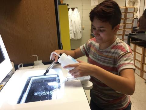 student in robinson lab